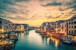 Famous grand canal from Rialto Bridge at blue hour, Venice, Italy.