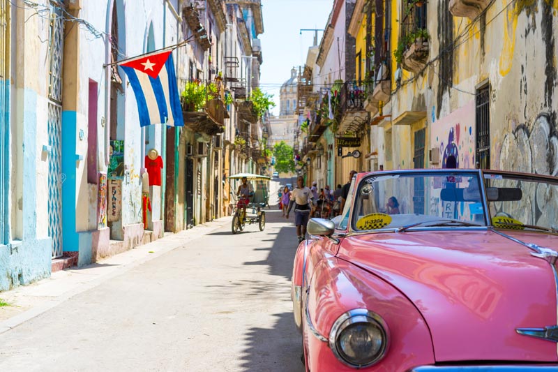 Cuban streets with an red old Chevy